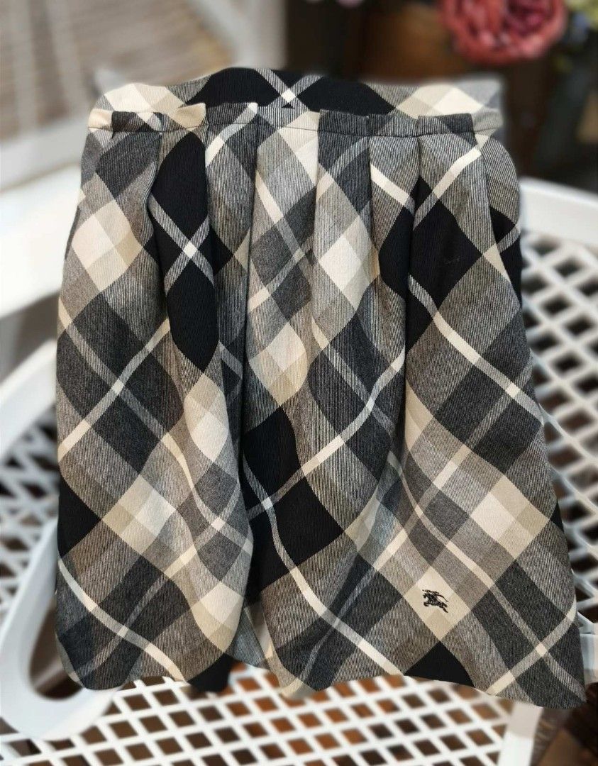 Authentic Burberry Plaid Skirt Size EU34 (Category: Skirts) located in Aguinaldo. Submitted by designerlaneph (Listing ID 1454155756, Image 1). Description: Previously owned Burberry plaid skirt size EU34 💯% authentic in nice condition free shipping onhand.