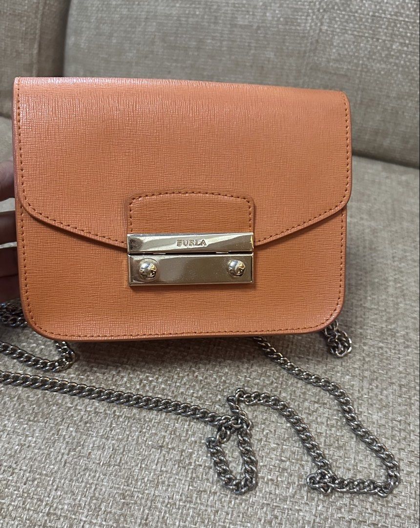 Authentic Furla Metropolis Sling Bag (Category: Luxury Bags & Wallets) located in Las Pinas. Submitted by marshmallowmax (Listing ID 1454051171, Image 1). Description: Guaranteed Authentic! Slightly used, no flaws.