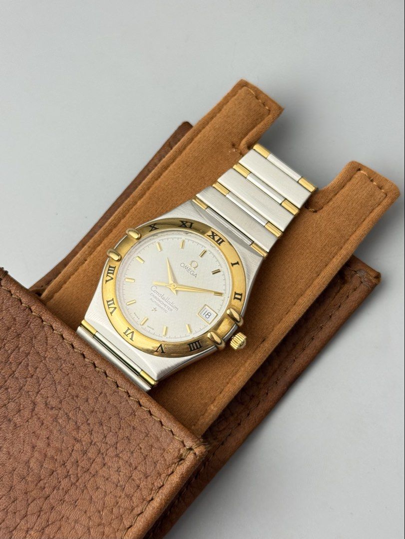 Authentic Omega Constellation "Manhattan" (Category: Luxury Watches) located in Manila. Submitted by justinsaliba (Listing ID 1454160430, Image 1). Description: Brand: Omega Model: Constellation "Manhattan" Year: Circa 1990s Movement: Automatic (Cal. 1111 / 1120) – COSC Certified Chronometer Case Size: 35mm Dial & Crystal: Silver dial with date display at 3 o'clock; scratch-resistant Sapphire Crystal Material: Two-tone Stainless Steel with 18k So