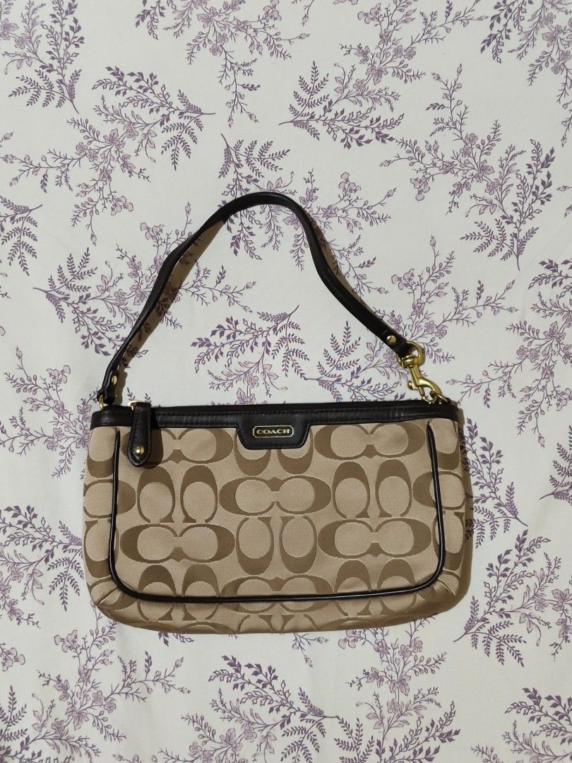 authentic vintage beige brown Coach mini bag (Category: Luxury Bags & Wallets) located in Bulacan. Submitted by angel.decluttersx (Listing ID 1454139240, Image 3). Description: brand new not pre-loved never been used, collection lang sa bahay colour: beige, brown. materials: canvas, genuine leather, gold-tone hardware no issue; in excellent vintage condition dimes: 24 x 14 cm can provide video.