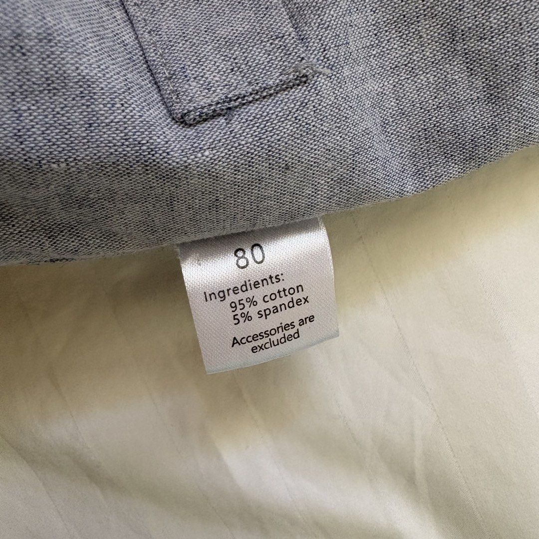 Baby Grey Vest (Category: Babies & Kids Fashion) located in Nabua. Submitted by fourpreloved_ (Listing ID 1454149847, Image 2). Description: - Grey baby vest, perfect for layering. - Size: 80 - Material: Soft 95% Cotton, 5% Spandex blend - Features: Three black button front closure - Pockets: Two at the bottom, one small chest pocket - Detail: Chic black strap detail on the back.