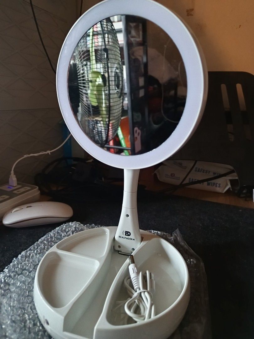 BeautéDerm FoldAway Mirror with LED Lights (Category: Face Care) located in Rizal. Submitted by saltyspicyy (Listing ID 1454070251, Image 2). Description: BeautéDerm FoldAway Mirror • Complete Inclusion • Double-sided with LED lights on front and back • Extends up to 13 inches high • One side: 10x magnification • Other side: 1x magnification • Folds flat for easy storage and travel • Requires 4 AA batteries (not included) MOP: GCash, bank transfe