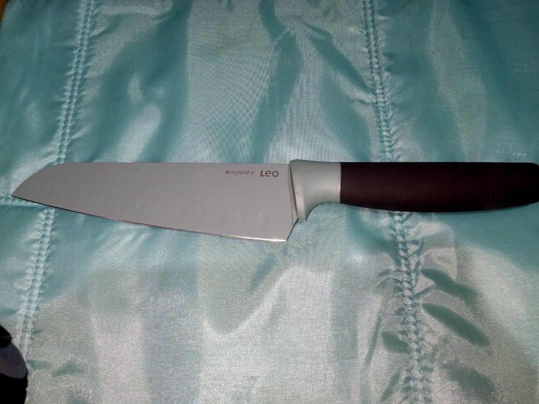 BergHOFF Leo Santoku Knife (Category: Knives & Chopping Boards) located in Pasig City. Submitted by urdal01 (Listing ID 1454126946, Image 1). Description: - BergHOFF Leo Santoku Knife - Blade: 8 inches, matte finish with dimples - Handle: Dark brown and grey - Ideal for chopping and dicing.
