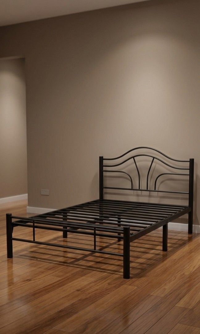 Black Metal Bed Frame with Headboard (Category: Bed Frames & Mattresses) located in Manila. Submitted by thea.magz (Listing ID 1454038618, Image 1). Description: - Dimension: 54×75 - Sleek black metal bed frame - Modern design with a curved headboard - Sturdy and provides excellent support - Easy to assemble - Mattress not included - Lightly Used it just stuck for a long time with flaws * first and second photo for visualization only Shipping/Pic