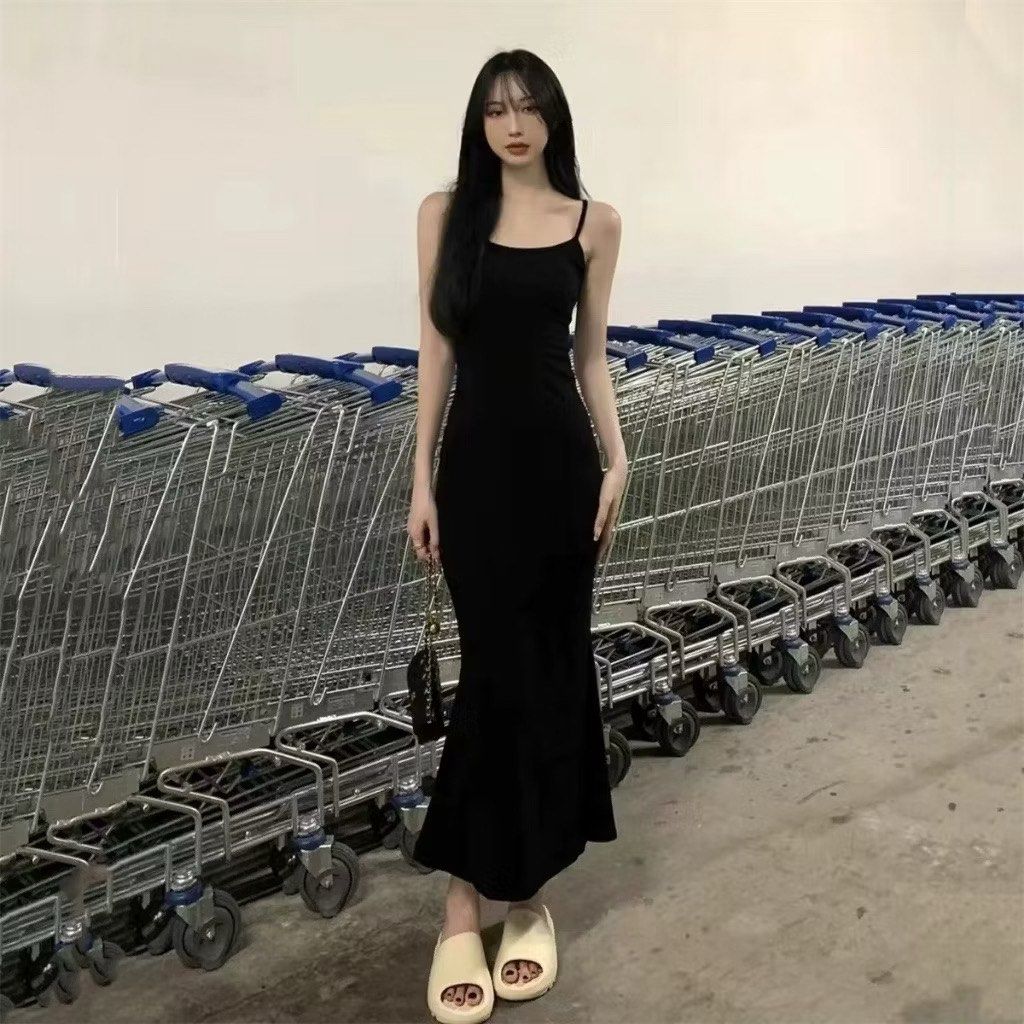 Black Spaghetti Strap Mermaid Maxi Dress (Category: Dresses) located in Manila. Submitted by sakuraa27 (Listing ID 1454021127, Image 2). Description: - Sleek black maxi dress - Features delicate spaghetti straps - Flattering mermaid silhouette that accentuates your figure - Made with stretchy material for ultimate comfort - Highly versatile: perfect for dressing up or down - Pairs well with heels or sandals - Ideal for a night out or a casual day