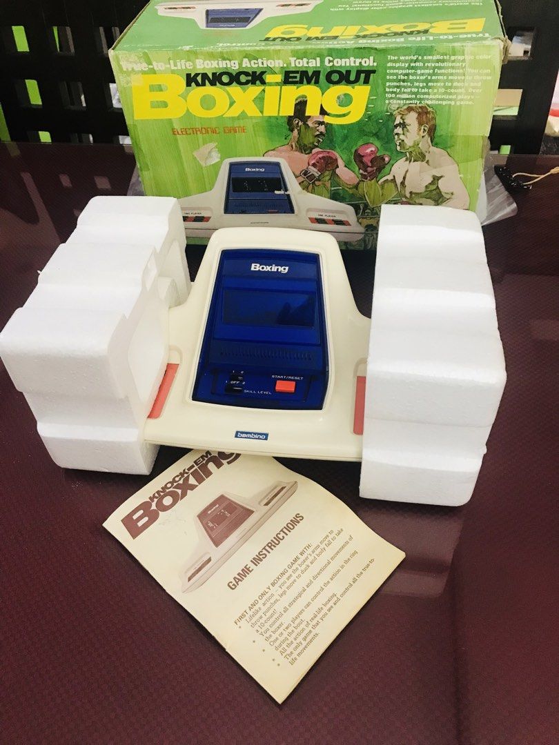 Boxing Table Top Game (2Players) 1979 (Category: Board Games & Puzzles) located in Quezon City. Submitted by regiegeorg77224 (Listing ID 1454097724, Image 2). Description: Brandnew Mint Condition Complete with Manual Intact Box and Styrofoam Vintage Hand held games 1-2 Players Retro Table top game Knock Em Out (Bambino) 1979 QC area Lalamove Bank transfer.