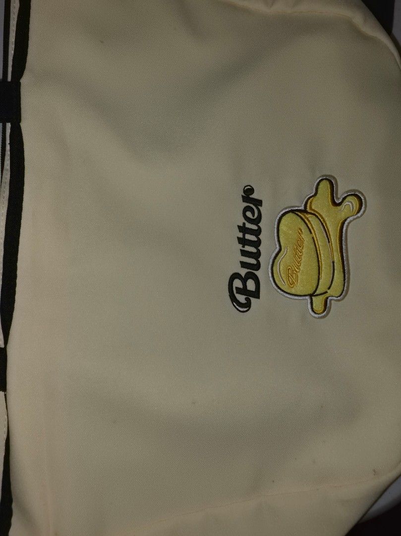 BTS Butter Tote Bag with Charm (Category: Tote Bags) located in Cavite. Submitted by contactcc (Listing ID 1454071843, Image 3). Description: BTS Butter Tote Bag with Charm Needs cleaning due to storage stains (see attached photo for reference) Used once RFS: Decluttering .