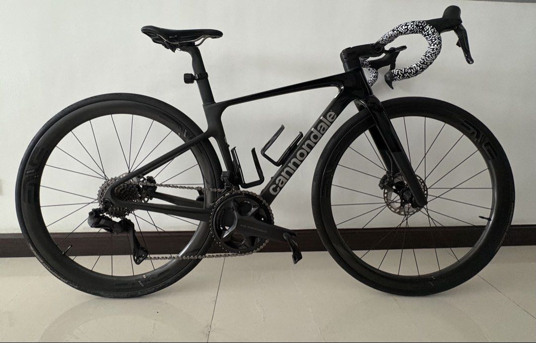 Cannondale SS EVO HiMod Road Bike (Category: Bicycles) located in Mandaluyong City. Submitted by mia_i. (Listing ID 1454058724, Image 1). Description: - Cannondale SuperSix EVO HiMod (Smoke Black, size 44; 2024) - Shimano Ultegra Di2 R8170 with Left-Side 4iiii PRECISION 3+ Powermeter (crank length 165) - Enve SES 3.4 wheelset - Enve Aero in-route stem and handlebar P320,000 Less than 20 rides RFS: back to gravel.