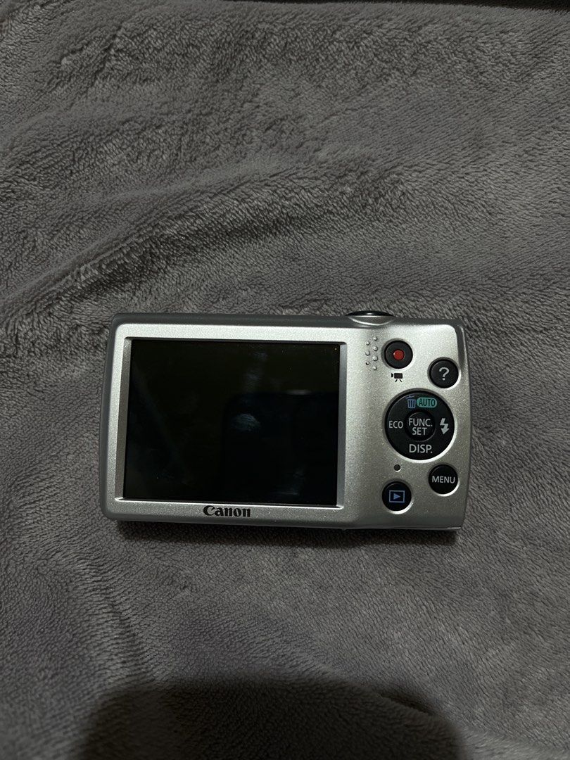 CANON POWERSHOT A2500 HD GOOD CONDITION (Category: Cameras) located in Manila. Submitted by ninib33 (Listing ID 1454120894, Image 3). Description: NO HIDDEN ISSUES!! CONDITION: 10/10!! NO SCRATCHES FULLY FUNCTIONAL - Red Canon Digital Camera - 16.0 Megapixels for clear shots - 5x Optical Zoom to get closer - Great for casual everyday photography - Easy to use, point-and-shoot functionality - Battery and card compartment located at the bottom come