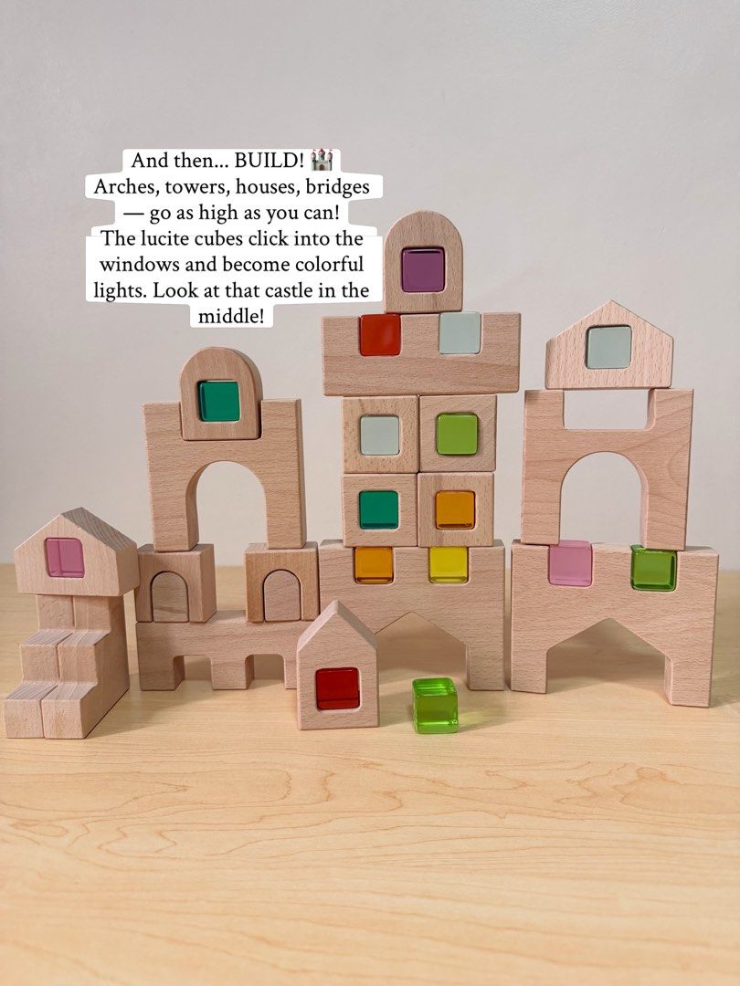 Castle with lucite cubes (Category: Educational & Learning Toys) located in Pasig City. Submitted by timberthinksph (Listing ID 1454146995, Image 2). Description: A whole city in one tray 🏘️🌈✨ Our Wooden City Building Blocks + 15 Lucite Cubes set Natural beechwood houses, arches, castles + those jewel-like rainbow cubes as windows and lights. From flat puzzle → to tall city. One set, two ways to play. Puzzle + stacking + light play in one! .
