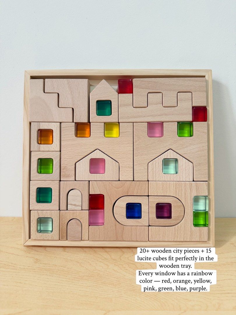 Castle with lucite cubes (Category: Educational & Learning Toys) located in Pasig City. Submitted by timberthinksph (Listing ID 1454146995, Image 1). Description: A whole city in one tray 🏘️🌈✨ Our Wooden City Building Blocks + 15 Lucite Cubes set Natural beechwood houses, arches, castles + those jewel-like rainbow cubes as windows and lights. From flat puzzle → to tall city. One set, two ways to play. Puzzle + stacking + light play in one! .