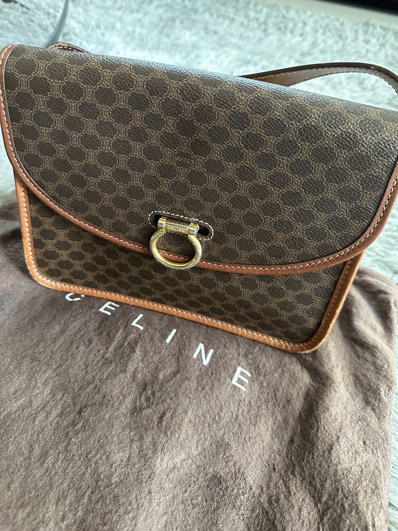 Celine Macadam Shoulder Sling Bag (Category: Luxury Bags & Wallets) located in Manila. Submitted by marmarpec (Listing ID 1454052933, Image 2). Description: - Iconic Vintage Celine Macadam - Rich brown leather trim - Elegant gold hardware on front closure - Adjustable leather strap for comfort - Comes with original Celine dust bag - some scratches at edges —Interior is clean, no scratches /stains - A timeless and versatile addition to any wardrob