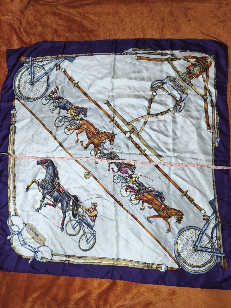 Celine Paris Silk Scarf Horse Carriage Print (Category: Scarves) located in Cagayan de Oro. Submitted by smoothstyle (Listing ID 1454078310, Image 3). Description: - Vintage Celine Paris silk scarf - Features a charming horse and carriage print with equestrian motifs - Rich colors and intricate details - Made in Italy - Generous size: approximately 35 inches x 35 inches - A timeless and elegant accessory.