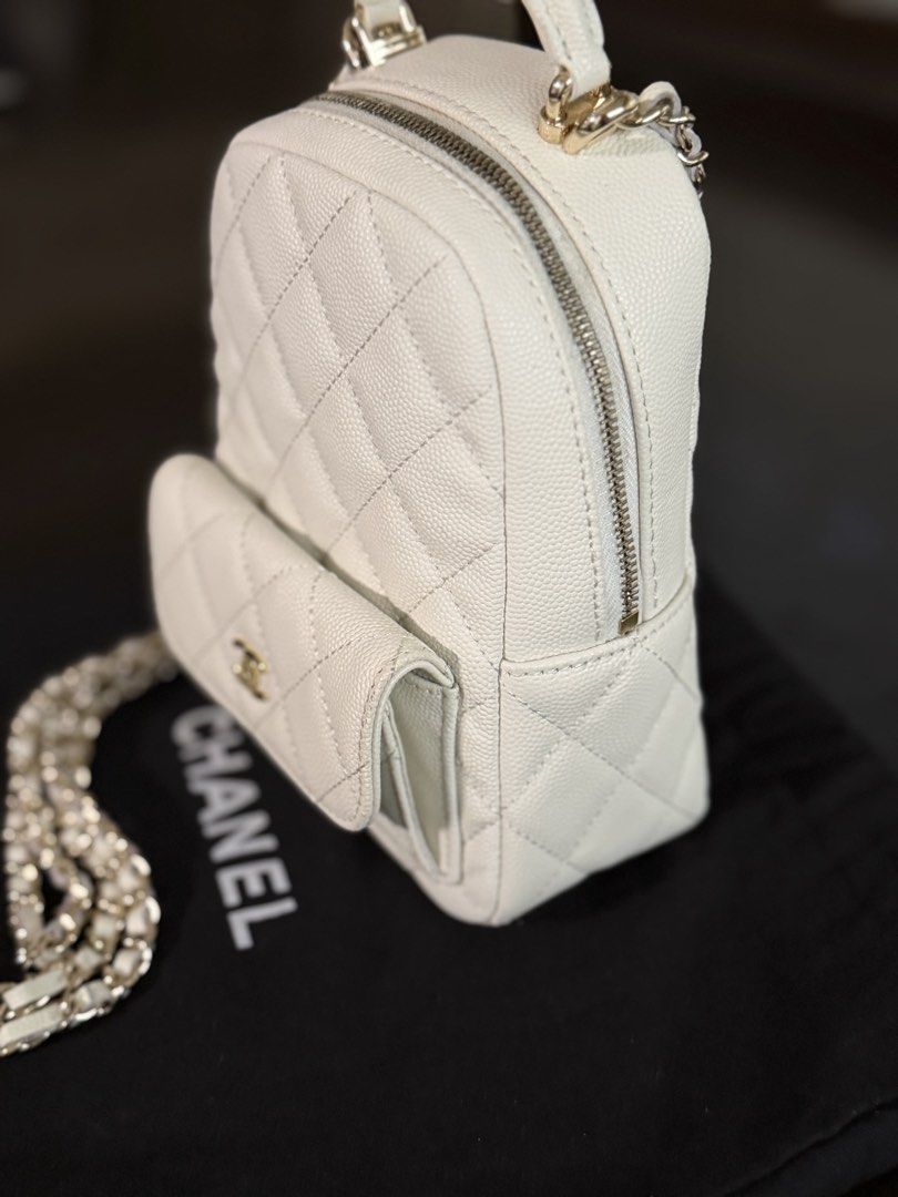 Chanel White Quilted Caviar Leather Mini Backpack (Category: Luxury Bags & Wallets) located in Quezon City. Submitted by anikalaine (Listing ID 1454031116, Image 3). Description: Chanel Mini Backpack Thrifted in Seoul, will pass new - Material: Black Caviar Leather - Hardware: Gold Chain Straps - Features: Quilted pattern, front pocket with iconic CC logo, top handle - Includes: dust bag North Susana QC Bank transfer.