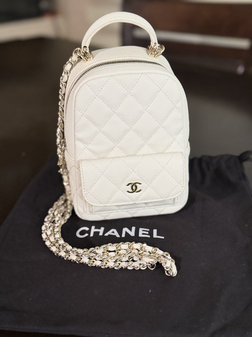 Chanel White Quilted Caviar Leather Mini Backpack (Category: Luxury Bags & Wallets) located in Quezon City. Submitted by anikalaine (Listing ID 1454031116, Image 1). Description: Chanel Mini Backpack Thrifted in Seoul, will pass new - Material: Black Caviar Leather - Hardware: Gold Chain Straps - Features: Quilted pattern, front pocket with iconic CC logo, top handle - Includes: dust bag North Susana QC Bank transfer.