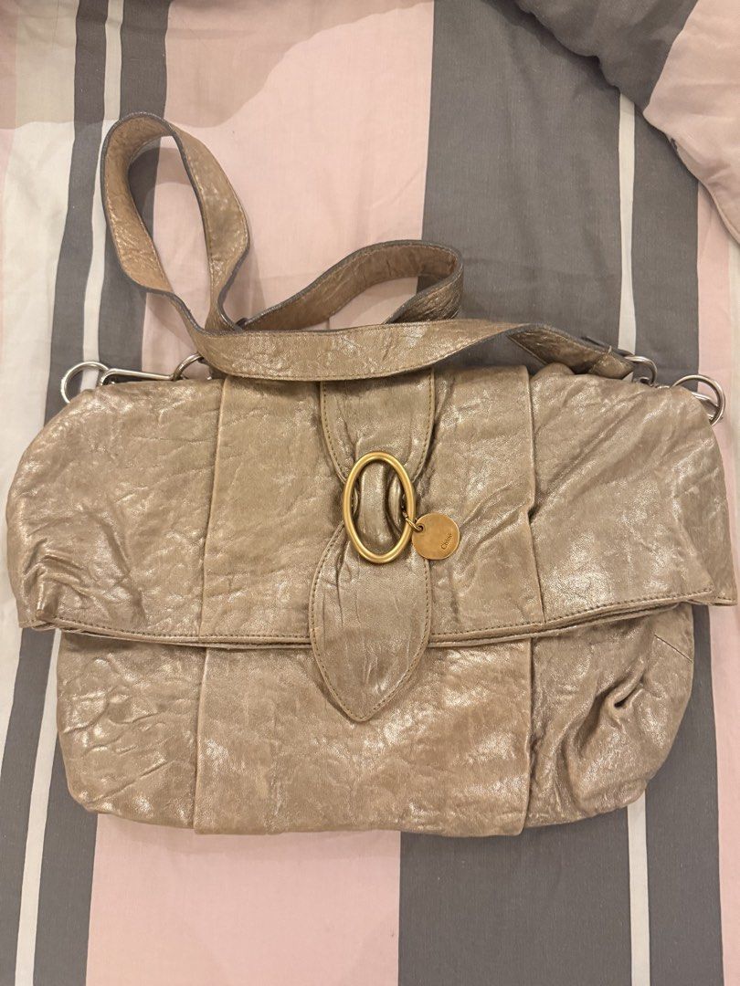 Chloe Bag (Category: Luxury Bags & Wallets) located in Urdaneta. Submitted by inahlovetrends (Listing ID 1454018712, Image 2). Description: This vintage Chloé Crinkled Metallic Leather Shoulder Flap Bag dates back to the mid-to-late 2000s, an era when the French fashion house was highly celebrated for its slouchy, bohemian aesthetics.