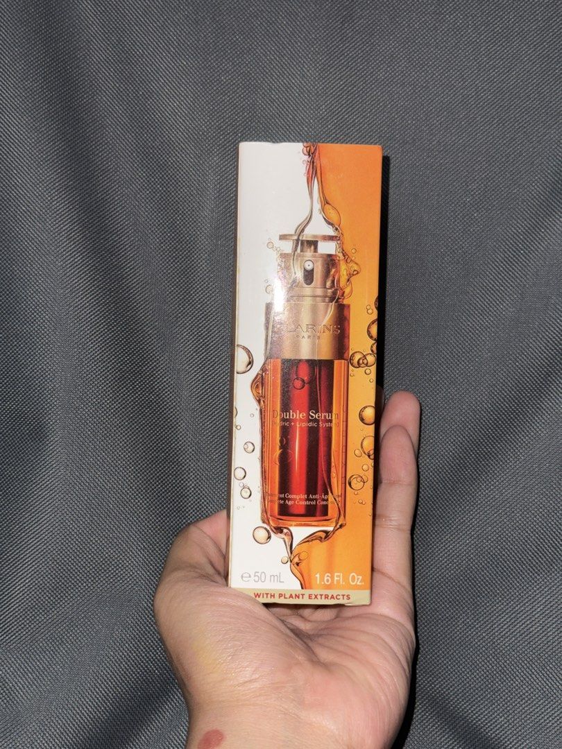 Clarins Double Serum 50ml with Plant Extracts (Category: Face Care) located in Quezon City. Submitted by jeddx (Listing ID 1454064518, Image 1). Description: - Clarins Double Serum - 50ml size - Hydric + Lipidic System - Anti-aging concentrate - Features plant extracts - Promotes skin renewal - Comes in original packaging RFS: I did not get to use it for I have many skin care products using right now 😭 MOP: BPI/ Gcash.