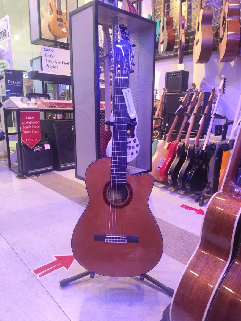 Classical Guitar (Category: Musical Instruments) located in Caloocan City. Submitted by jejifer0727 (Listing ID 1454110774, Image 1). Description: - 39" w/ pick up - spruce top (gloss finish) - Mahogany back/side - w/ 5mm padded bag, strap and allen wrench.