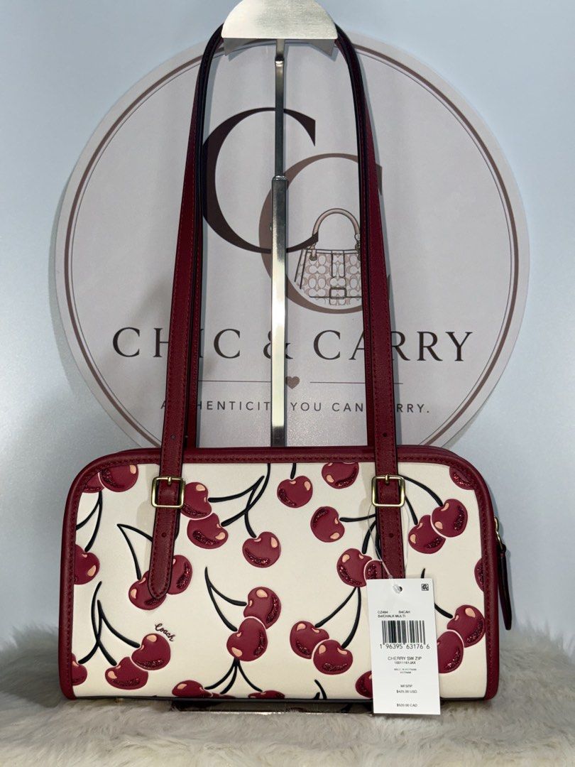 Coach Swing Zip - Cherry Print (Category: Luxury Bags & Wallets) located in Quezon City. Submitted by chicandcarry.ph (Listing ID 1454073960, Image 1). Description: ✨Brandnew 💯 Original Coach Bag 🤎Inclusion: Complete with tag, cc, poly & dustbag 📩PM for more details.