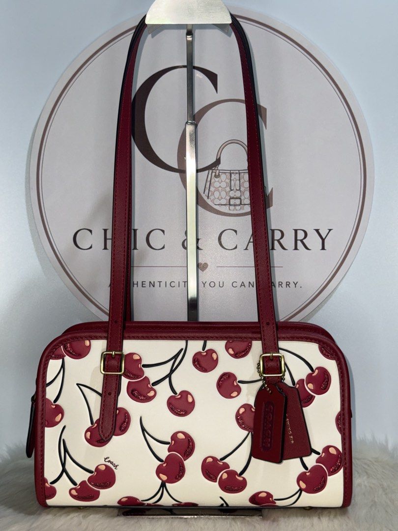 Coach Swing Zip - Cherry Print (Category: Luxury Bags & Wallets) located in Quezon City. Submitted by chicandcarry.ph (Listing ID 1454073960, Image 2). Description: ✨Brandnew 💯 Original Coach Bag 🤎Inclusion: Complete with tag, cc, poly & dustbag 📩PM for more details.