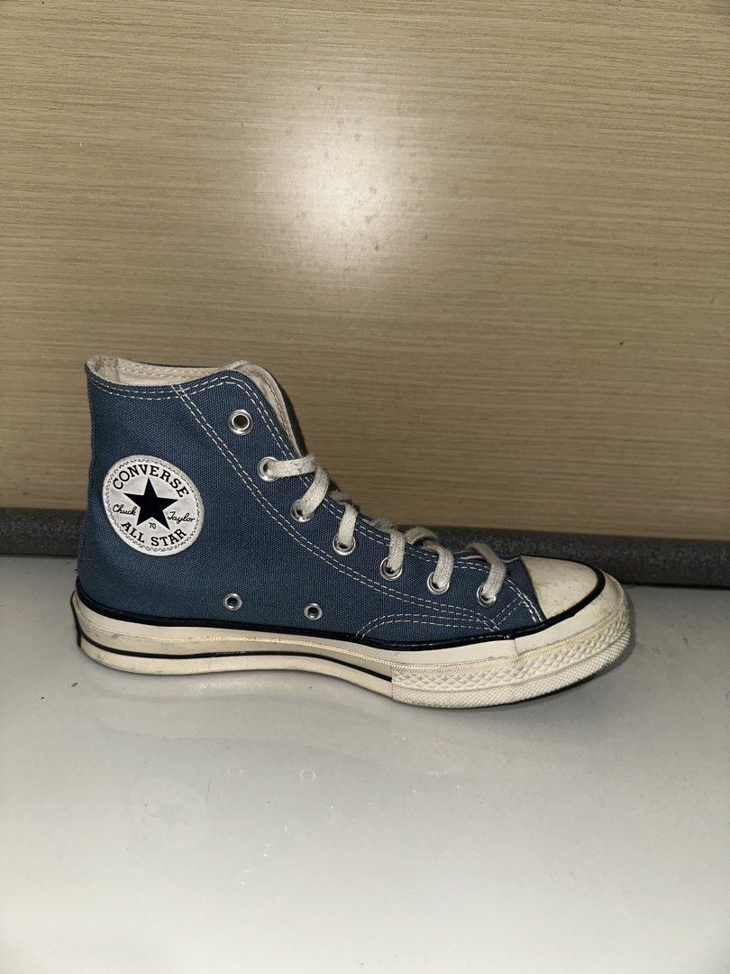 Converse Chuck Taylor All Star High Top Blue (Category: Sneakers) located in Manila. Submitted by barntobeep (Listing ID 1454117709, Image 2). Description: - Classic blue Converse high tops - Canvas material - White laces and rubber toe cap - Iconic Chuck Taylor All Star logo on the side - Soles show some wear and dirt - Mode of Payment: Gcash, Maya, GoTyme, RCBC - Mode of Delivery: GrabExpress or LBC - Shipping will be shouldered by the buyer.