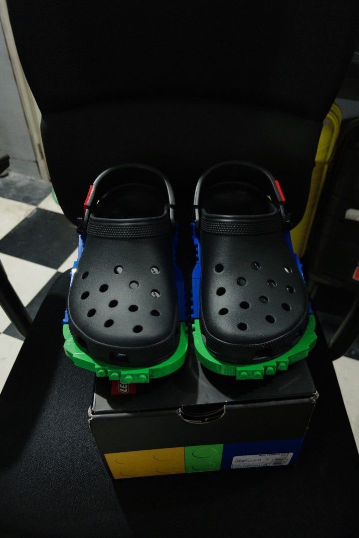Crocs x Lego (Category: Slippers & Slides) located in Quezon City. Submitted by golfjuliett_ (Listing ID 1454087632, Image 2). Description: M9 W11 -used once! - LEGO x Crocs Classic Clog in black - Features colorful LEGO brick-inspired detailing on sole and heel strap - Unique collaboration piece for fans of both brands - Comes with original box - Adds a playful touch to any outfit.