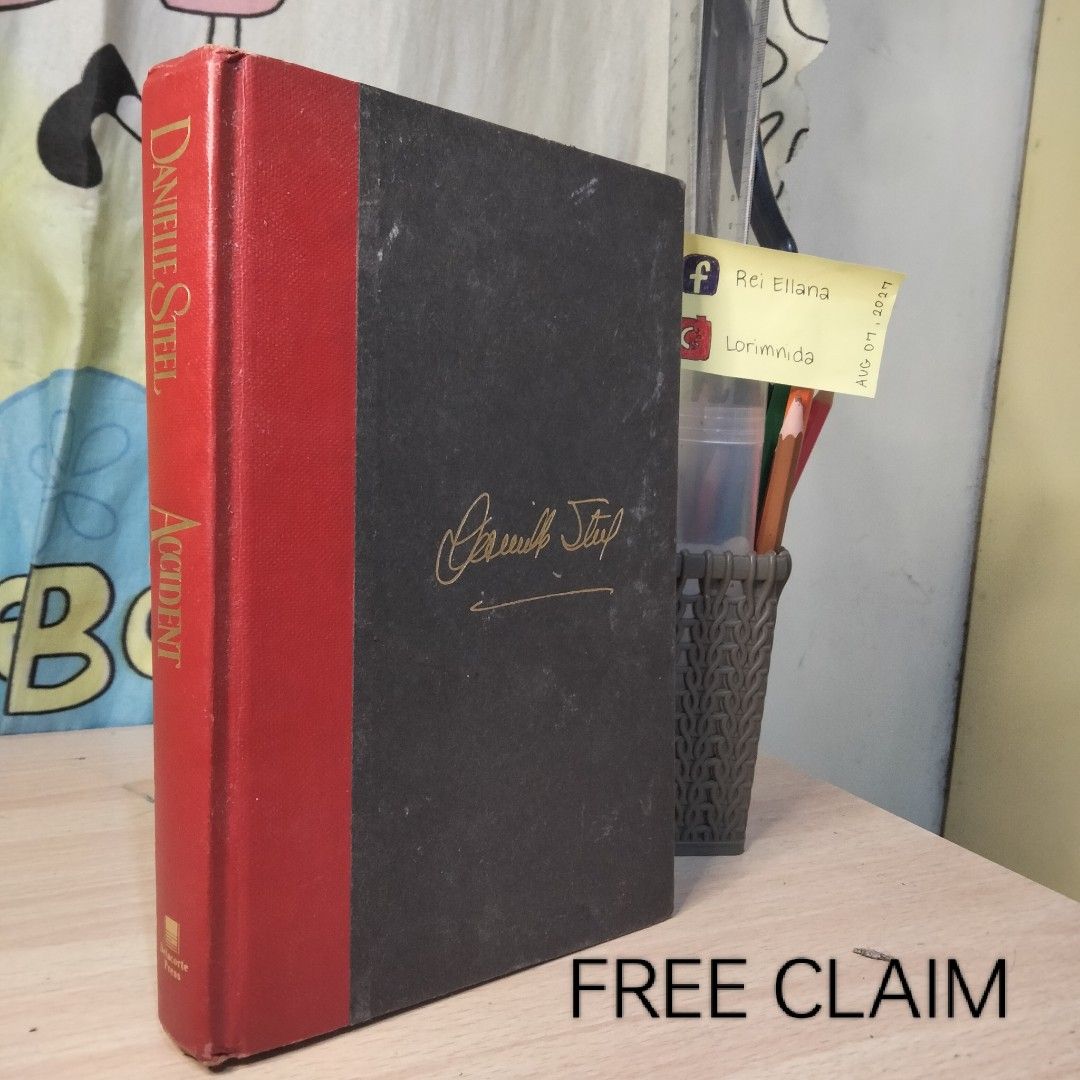 Danielle Steel Accident Hardcover Book (Category: Storybooks) located in Muntinlupa City. Submitted by lorimnida (Listing ID 1454175474, Image 1). Description: Free for any purchase, just ask for it :) - Danielle Steel's 'Accident' hardcover book - Features a striking red spine - Dark grey cover with elegant gold author signature - Free claim available!.