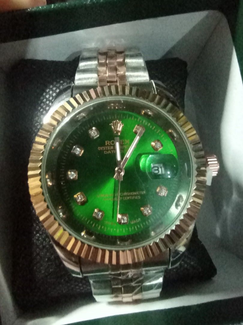 Datejust Green Dial Two-Tone Diamond Watch (Category: Luxury Watches) located in Manila. Submitted by crustynico23 (Listing ID 1454183002, Image 2). Description: - Datejust - Stunning green dial with diamond hour markers - Elegant fluted bezel - two-tone stainless steel Jubilee bracelet - Convenient date window at 3 o'clock - A timeless and classic timepiece.