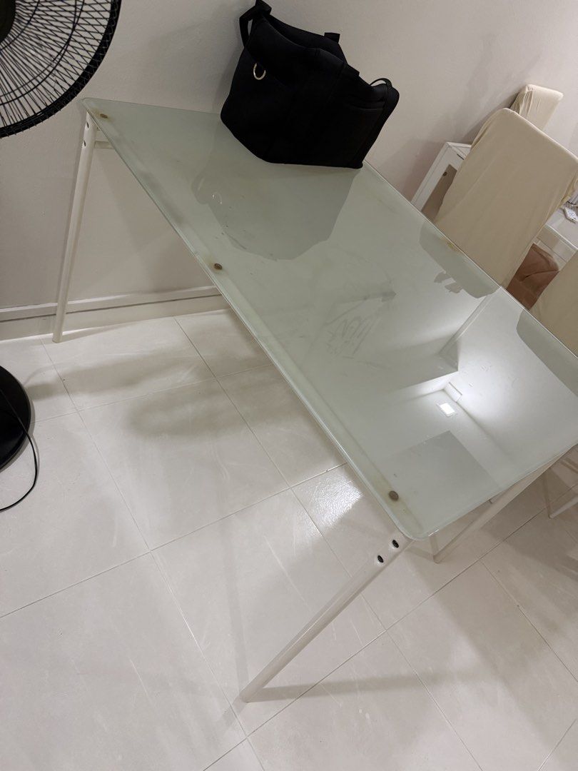 dining table (Category: Other Home Furniture) located in Singapore. Submitted by vain.vibes (Listing ID 1454021457, Image 2). Description: ikea dining table no chair just table table is class and metal frame pls arrange own transport and self pick up only thanks still good condition.