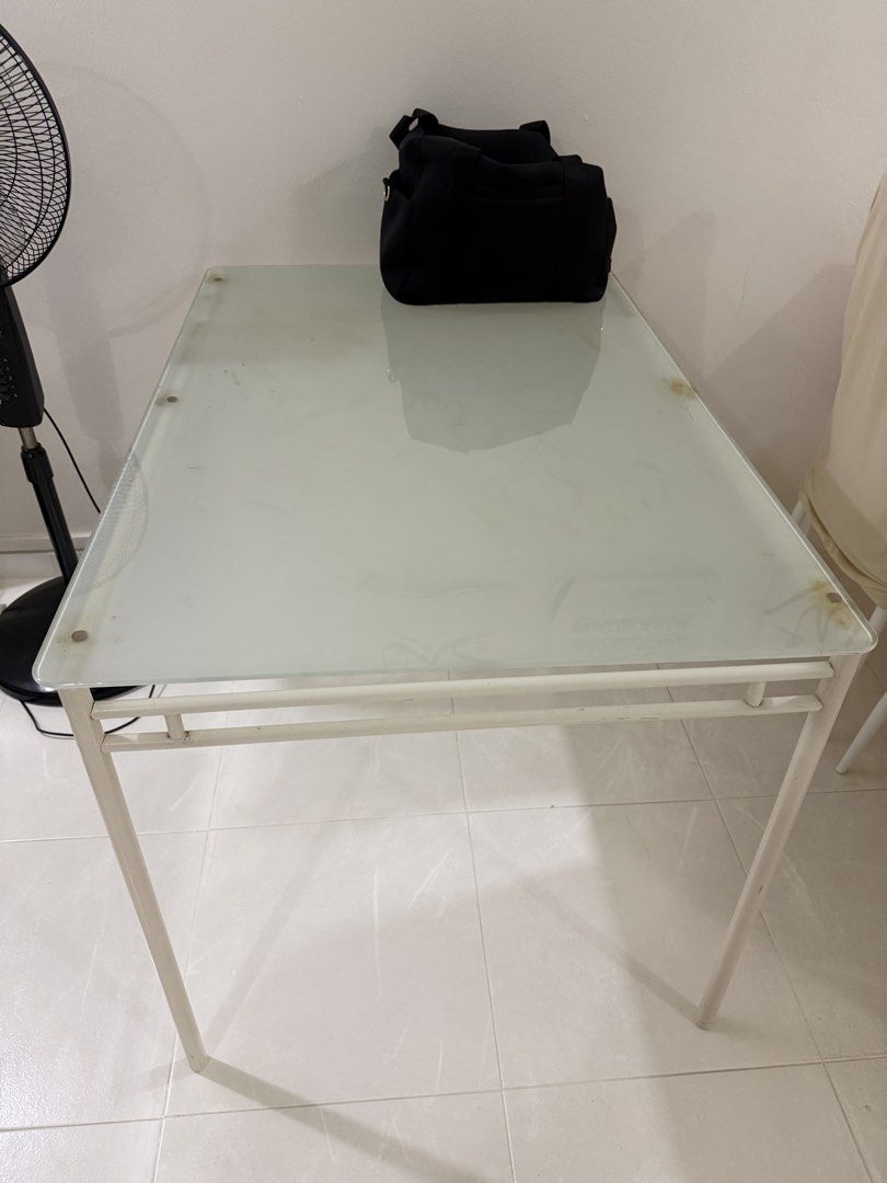 dining table (Category: Other Home Furniture) located in Singapore. Submitted by vain.vibes (Listing ID 1454021457, Image 1). Description: ikea dining table no chair just table table is class and metal frame pls arrange own transport and self pick up only thanks still good condition.