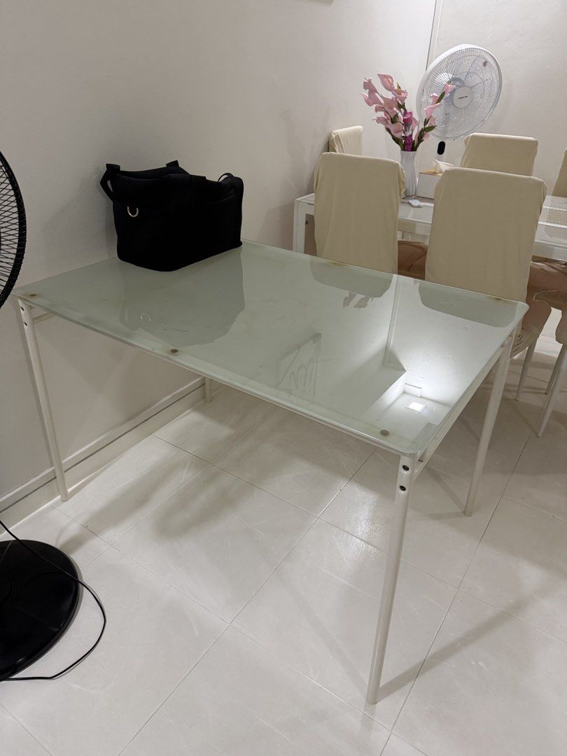 dining table (Category: Other Home Furniture) located in Singapore. Submitted by vain.vibes (Listing ID 1454021457, Image 3). Description: ikea dining table no chair just table table is class and metal frame pls arrange own transport and self pick up only thanks still good condition.