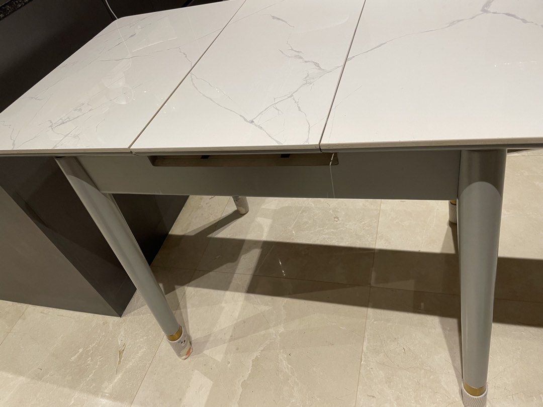 Dining table Extendable (Category: Tables & Sets) located in Singapore. Submitted by jellydogsnoopy (Listing ID 1454132246, Image 3). Description: Self pickup at 596159 Table size 60cm x 81cm (or 111cm with extension) Height around 76cm Good condition very new, no damage no scratch Bought around 270 SGD .