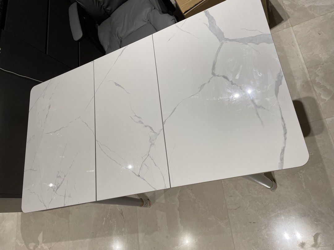 Dining table Extendable (Category: Tables & Sets) located in Singapore. Submitted by jellydogsnoopy (Listing ID 1454132246, Image 2). Description: Self pickup at 596159 Table size 60cm x 81cm (or 111cm with extension) Height around 76cm Good condition very new, no damage no scratch Bought around 270 SGD .