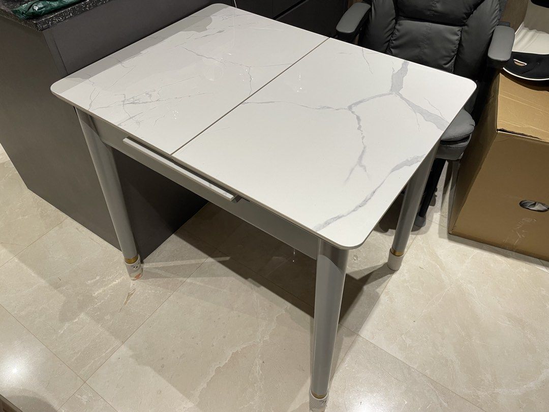 Dining table Extendable (Category: Tables & Sets) located in Singapore. Submitted by jellydogsnoopy (Listing ID 1454132246, Image 1). Description: Self pickup at 596159 Table size 60cm x 81cm (or 111cm with extension) Height around 76cm Good condition very new, no damage no scratch Bought around 270 SGD .