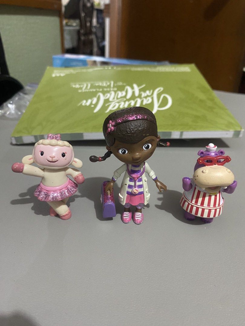 Doc McStuffins Lambie Stuffy Hallie Figurines Set @ 300 (Category: Kids Toys) located in Manila. Submitted by mommymaal (Listing ID 1454052962, Image 1). Description: - Set of Doc McStuffins figurines - Includes Doc, Lambie, and Hallie the Hippo - Ideal for fans of the show - Great for imaginative playtime - Made of durable plastic - Perfect for collectors or kids - 300/set .