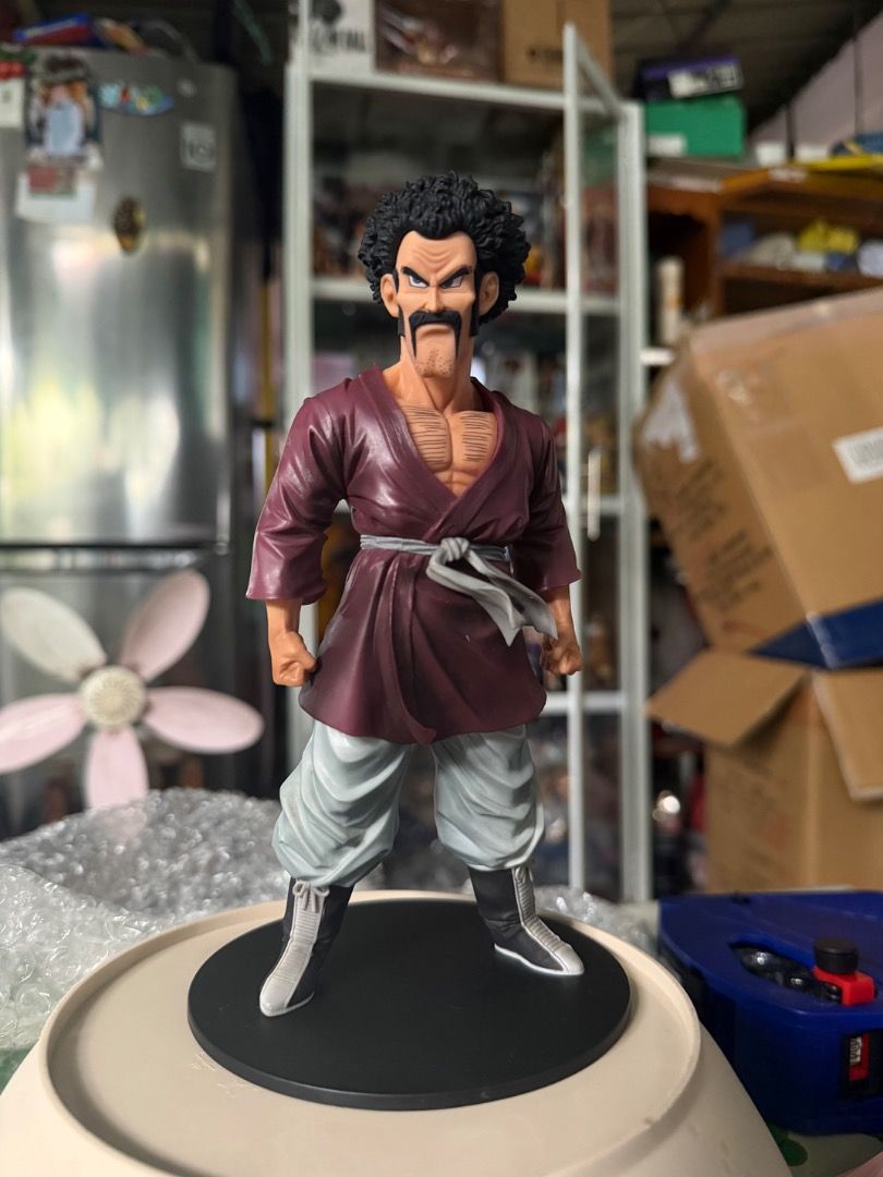 Dragon Ball Z Mr. Satan Action Figure (Category: Figurines & Statues) located in Munoz. Submitted by laramold (Listing ID 1454096857, Image 1). Description: - Authentic Mr. Satan figure from Dragon Ball Z - Includes a sturdy black display base - High-quality details, perfect for display - A must-have for any Dragon Ball Z fan's collection - Ready to find its new home!.