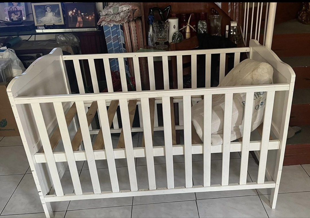 Dwelling Baby Crib (Category: Cots & Cribs) located in Bulacan. Submitted by unkn0wned1 (Listing ID 1454124213, Image 1). Description: for sale crib only sm dwelling baby crib -28x52 -adjustable to 3 heights -convertible to toddler bed very good used condition with some pencil scratches in the bed platform but can be covered by the foam (barely unnoticeable) orig mall price: 10k selling for 2400 with lp if sure buyer.