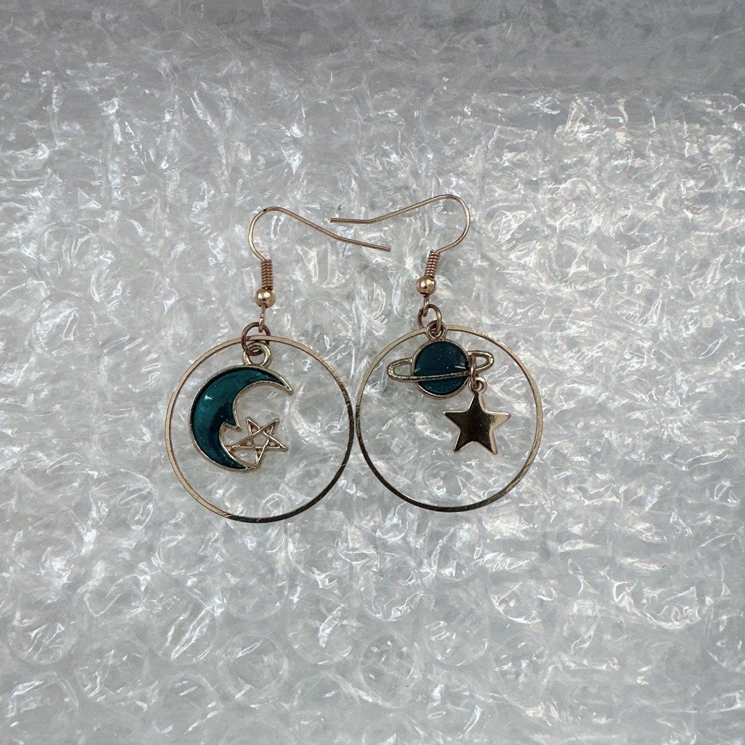 Earrings (Category: Earrings) located in Cheras. Submitted by clearloved (Listing ID 1454146021, Image 3). Description: Features charming moon, star, and planet designs Numbers of earrings Great for adding a pop of color to your outfit Price was listed by one pairs .
