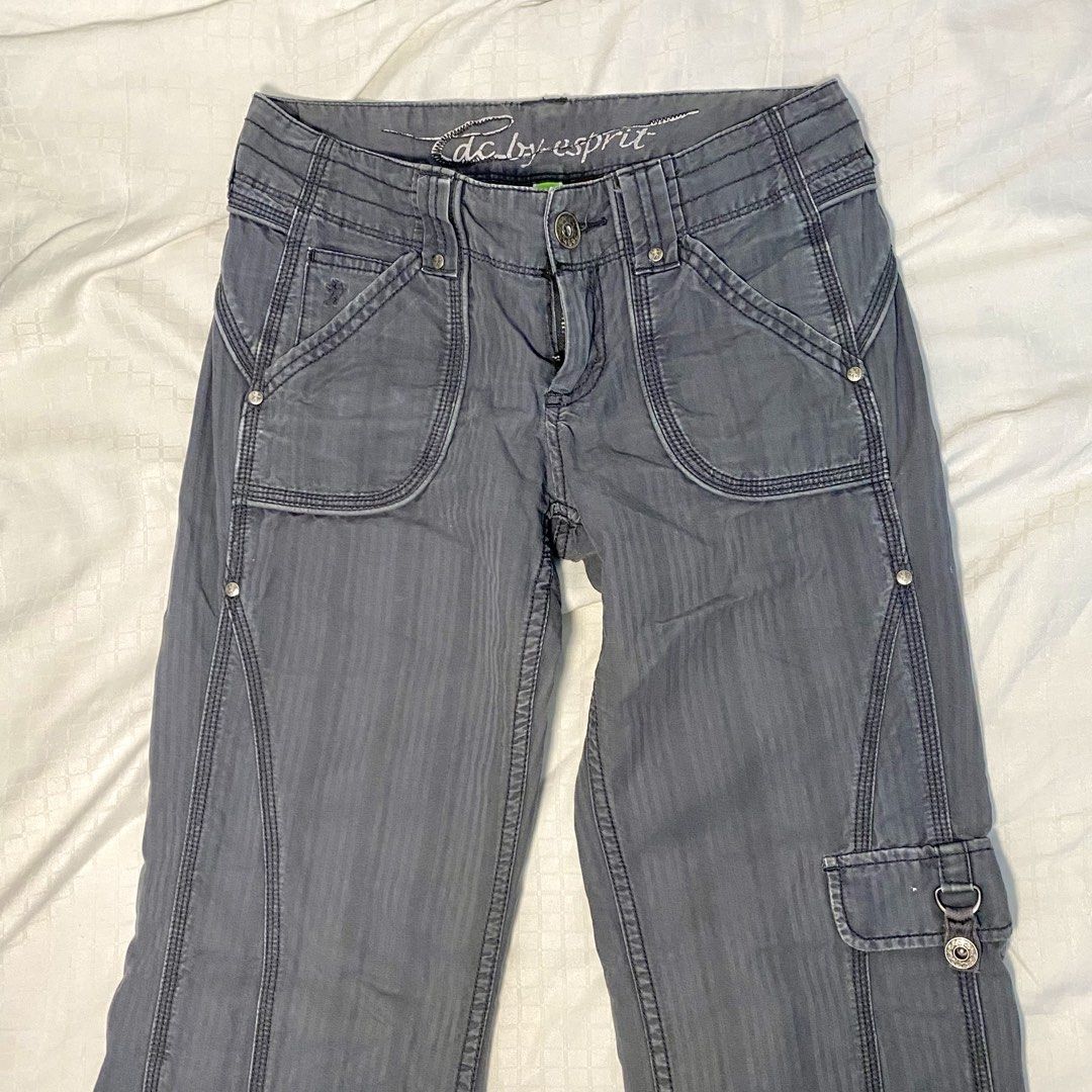 EDC by Esprit Grey Low Waist Cargo Pants Size (Category: Other Bottoms) located in Angeles City. Submitted by hunymoons (Listing ID 1454058401, Image 1). Description: - 27-28 in. waist - 7 in. rise - 38 in. length Esprit grey cargo pants - Unique textured fabric - Multiple pockets for storage - Side flap pocket - Button closure back pockets - Button and zip fly closure - Ideal for casual wear.