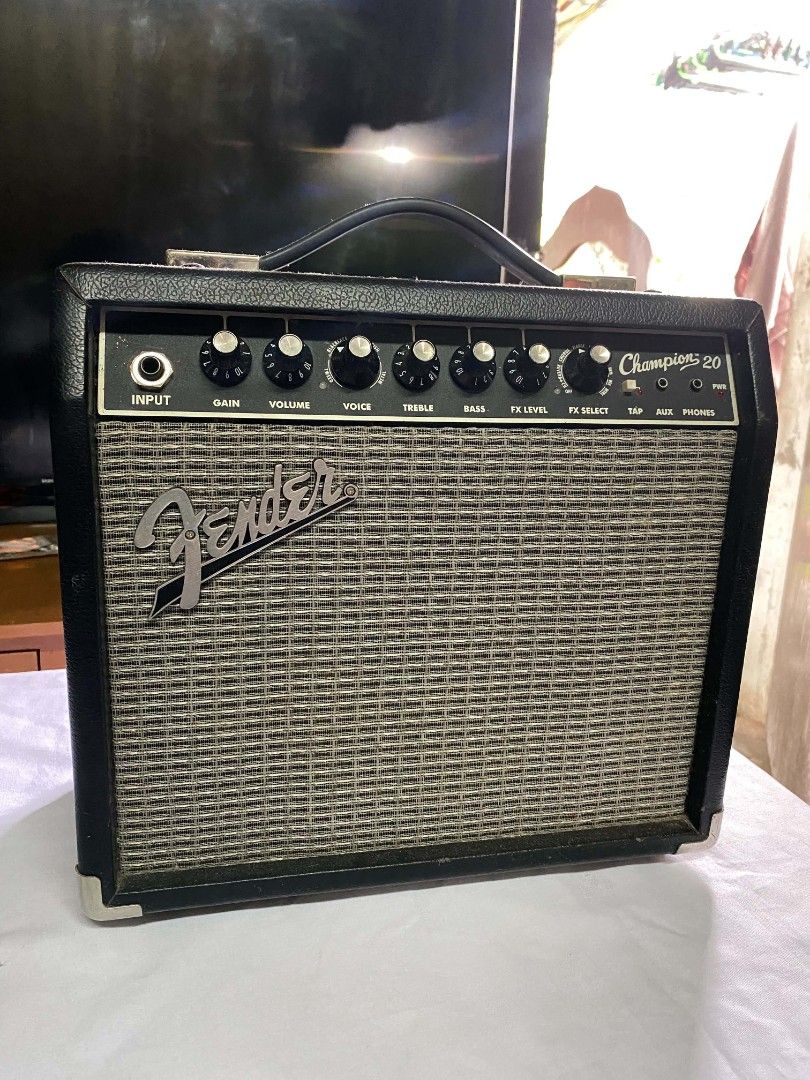 Fender Champion 20 Guitar Amplifier (Category: Musical Instruments) located in Naga. Submitted by thriftxie.finds (Listing ID 1454143750, Image 1). Description: ‼️FENDER CHAMPION 20 GUITAR AMPLIFIER ‼️ (preloved) -ideal for practice sessions and small gigs - offers multiple amp voices and built-in effects - includes controls for input, gain volume, voice,bass,treble,FX level, FX select, tap, aux, and phones - fully fuctional - no issue ₱8,000 (AU
