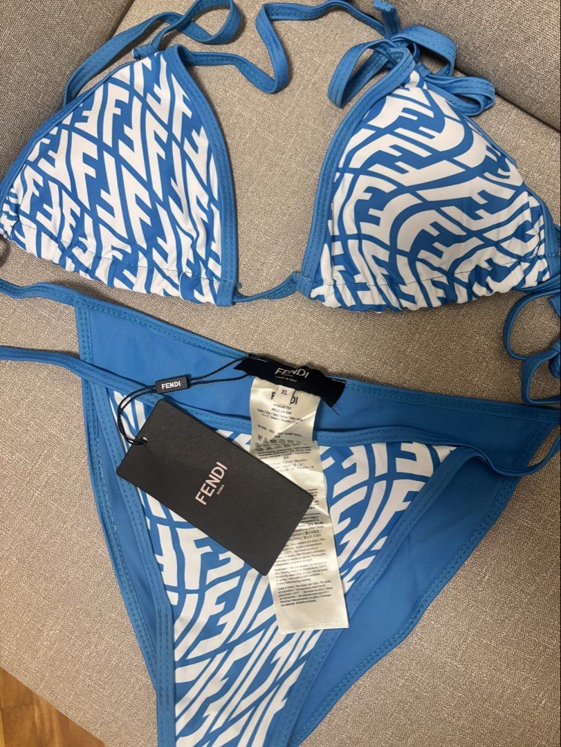 Fendi FF Logo Bikini Blue White Size XL (Category: Bikinis & Swimsuits) located in Paranaque City. Submitted by jujudeclutterss (Listing ID 1454104406, Image 1). Description: - Blue Fendi bikini - Iconic blue and white FF logo pattern - Triangle top with adjustable ties - Bikini bottoms with adjustable side ties - Size XL - Brand new with original tags attached.