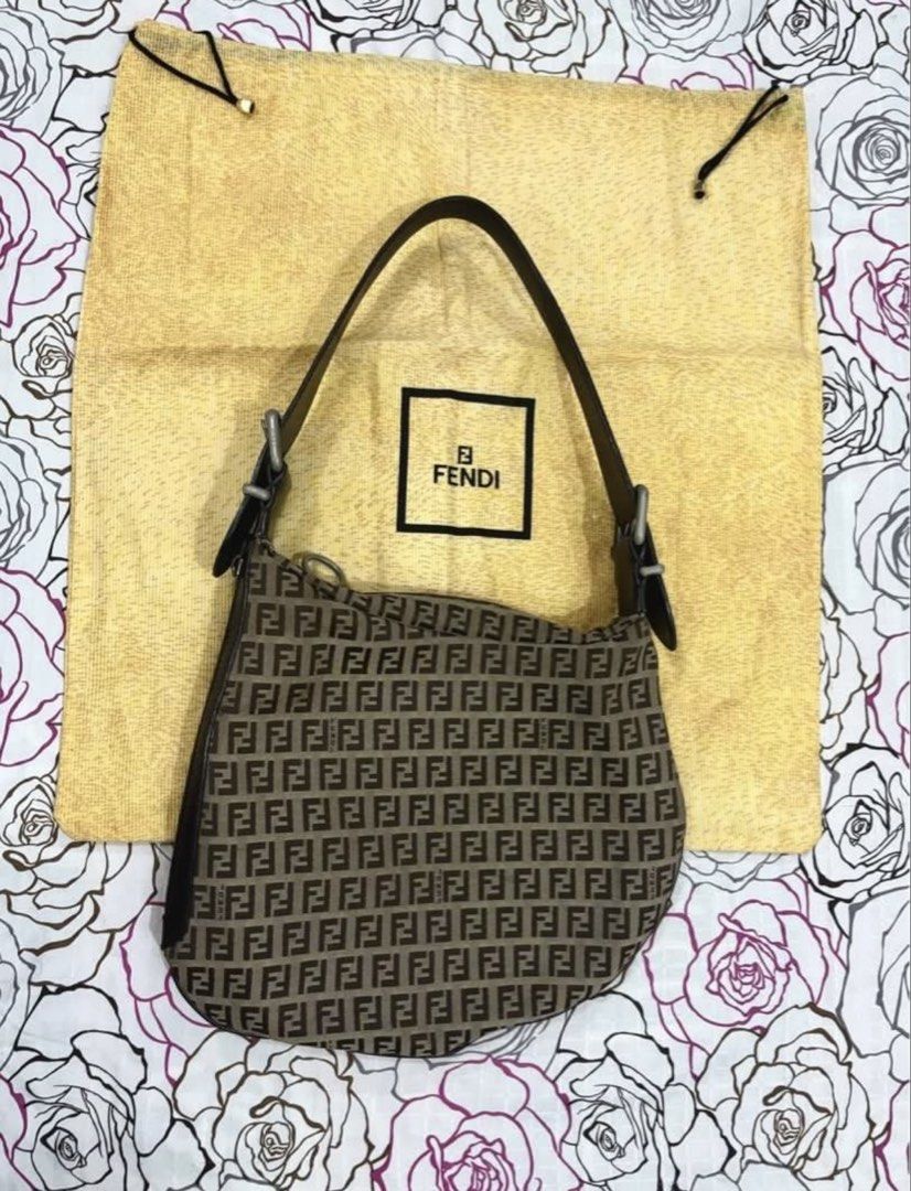 Fendi Zucca Oyster Bag (Category: Luxury Bags & Wallets) located in Iba. Submitted by luxbagsandblings (Listing ID 1454161860, Image 1). Description: 🌸Guaranteed 💯Authentic Fendi Zucca Monogram Oyster Shoulder Bag -💎RARE FIND!!✨ Vintage Piece 💛 (w/ an OPTION to add Authentication Certificate from Legit Grails Authentication Service for additional ₱1,800 only) -Slightly Negotiable✅ -Rank AB Condition✨ -Fendi Stamp on all hardwares -FF Zipper �