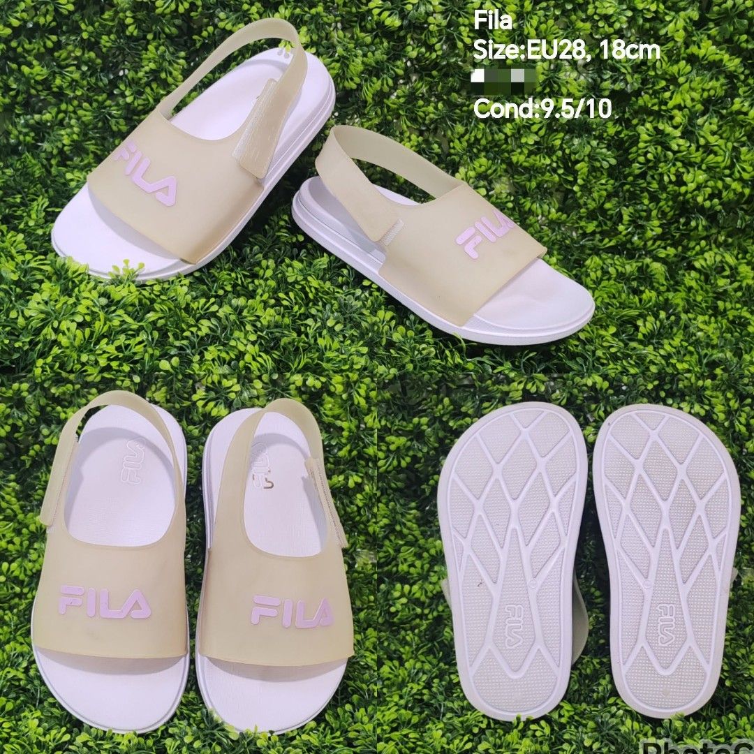 Fila Kids Sandals EU28 / 18cm (Category: Babies & Kids Fashion) located in General Trias. Submitted by joyce.asis026 (Listing ID 1454022428, Image 1). Description: - Fila kids sandals - Size: EU28 (18cm) - Color: Light beige straps with pink Fila logo - Soles: White - Condition: Great, only worn a few times - Plenty of life left - Ideal for everyday wear or beach.