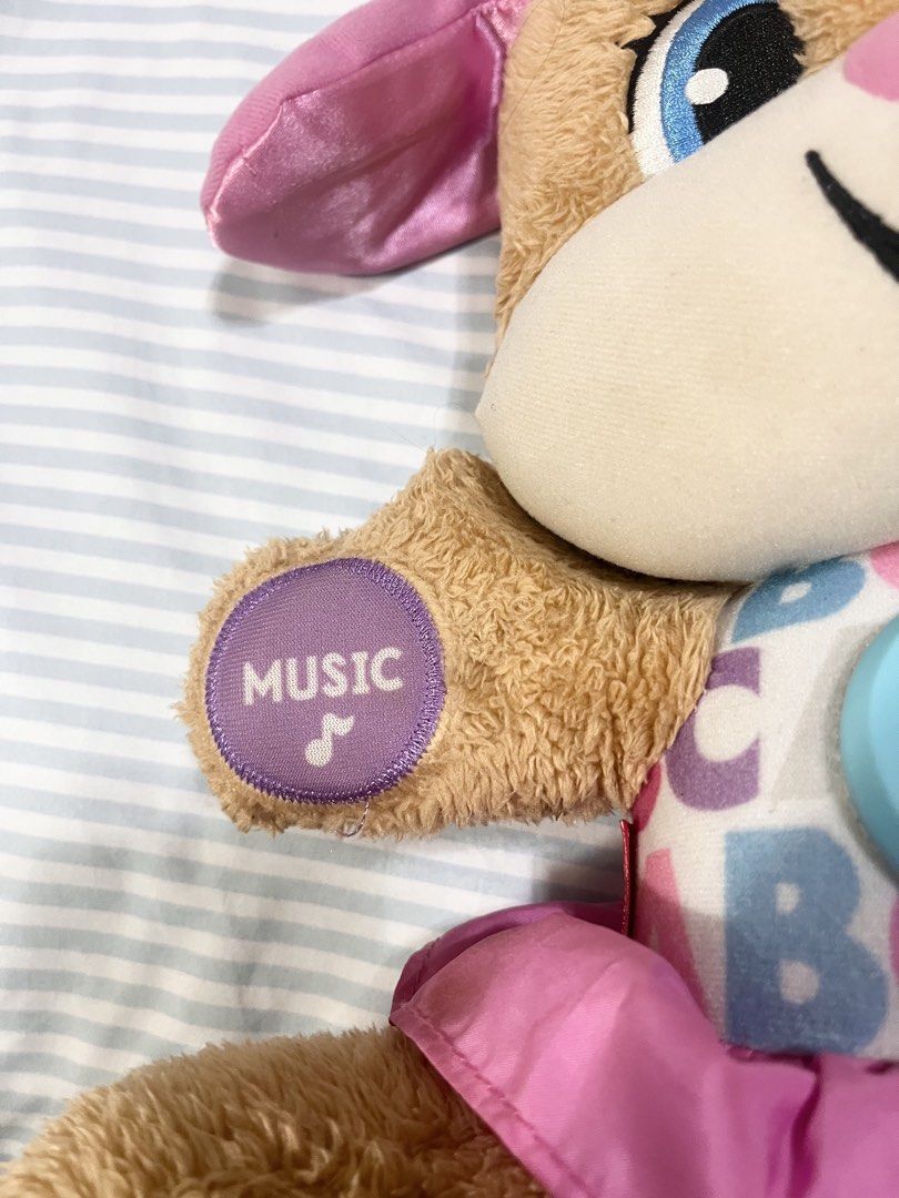 Fisher Price Smart and Learn Toy (Category: Infant Playtime) located in Quezon City. Submitted by babybutton2018 (Listing ID 1454004629, Image 3). Description: 📌The toy features over 100 first words and 75+ songs to teach babies and toddlers. 📌It includes interactive buttons on its paws and a light-up heart on its chest. 📌 Used but in good condition 📌Needs cleaning .