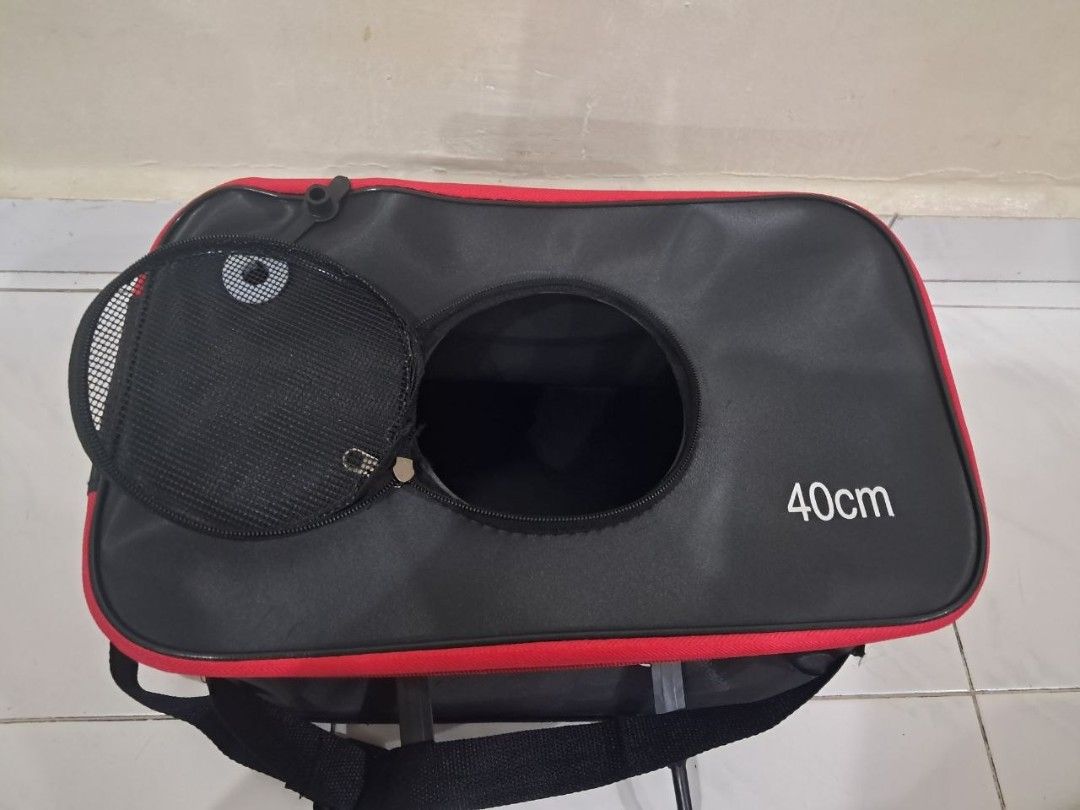 Fishing Bucket (Category: Fishing) located in Singapore. Submitted by excitedbabe (Listing ID 1454175708, Image 2). Description: - 40cm fishing bucket - Durable black and red design - Features a mesh opening for ventilation - Ideal for storing catch/live bait or fishing gear - Comfortable handle - Can put oxygen pump at the side, got hole for tube - 40 × 24 × 24 - 23 litres - Brand new, not used at all - Can nego for fast deal .