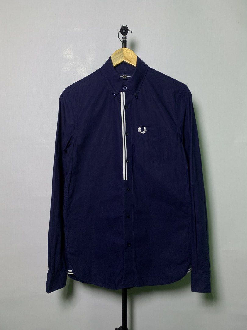 Fred Perry Polo Button Down Long sleeve (Category: Luxury Apparel) located in Manila. Submitted by macadr1p (Listing ID 1454157767, Image 2). Description: FRED PERRY Dimes: 19x28.5 Best fit: S/M Color rate: 10/10 Condition: Like New - no issues - Complete tags - Color not faded at all - Collar not faded - No sign of usage - High quality Fabrics - OVERALL💯 ✔ Premium fabric for all-day comfort ✔ Clean and versatile style ✔ Classic and modern color