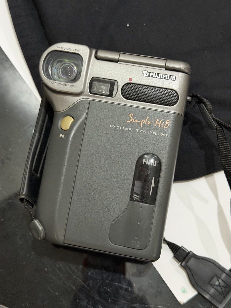 Fujifilm Simple-Hi8 Video Camera Recorder FS-80MT (Category: Video Cameras) located in Manila. Submitted by backupkarl37773 (Listing ID 1454048104, Image 1). Description: - Fujifilm Simple-Hi8 Video Camera Recorder - Model: FS-80MT - Features a flip-out screen - Includes strap condition: tapedeck working no battery included screen doesnt latch buttons working.