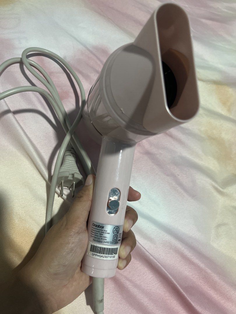 Gaabor Pink Compact Hair Dryer (Category: Hair) located in San Juan City. Submitted by superash (Listing ID 1454117199, Image 2). Description: - Pink Gaabor Hair Dryer - Compact and lightweight design - Easy to hold for comfortable use - Includes a cool shot button - Works very well - Ideal for travel or everyday styling - Comes with original plug.