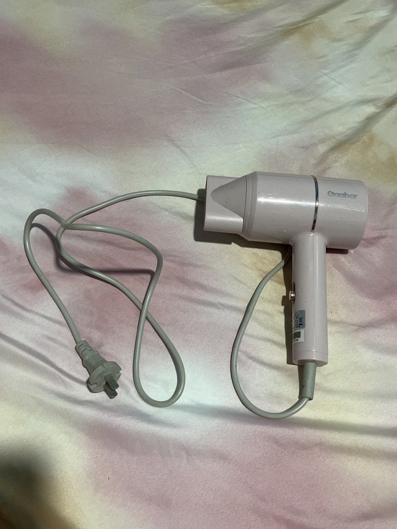 Gaabor Pink Compact Hair Dryer (Category: Hair) located in San Juan City. Submitted by superash (Listing ID 1454117199, Image 1). Description: - Pink Gaabor Hair Dryer - Compact and lightweight design - Easy to hold for comfortable use - Includes a cool shot button - Works very well - Ideal for travel or everyday styling - Comes with original plug.