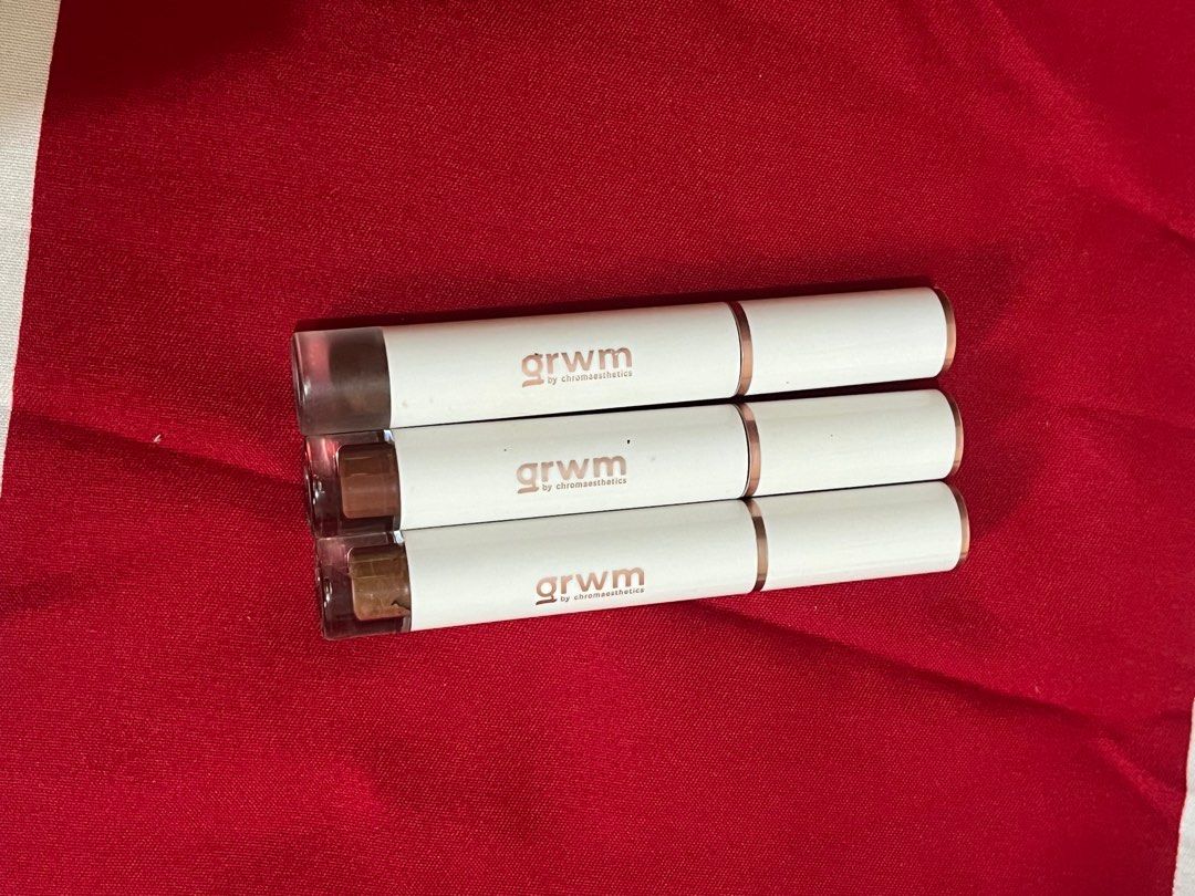 grwm tinted lip glaze (Category: Makeup) located in Manila. Submitted by orangeisloopy (Listing ID 1454085191, Image 1). Description: shades: 90s brown, upside brown, tangerine 60% full ₱120 each, ₱300 take all.